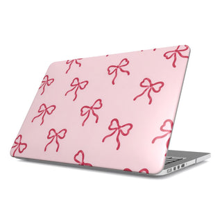 Red Bows MacBook case — hard-shell laptop cover, angled lid view