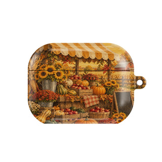 Harvest Market AirPods case — vintage farmers market stall with pumpkins and sunflowers, closed front view