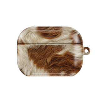 Chestnut Cowhide AirPods case — brown cow print, closed front view