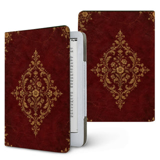 Oxblood Gilded Binding Kindle case — gold-tooled filigree medallion on oxblood, printed front and back