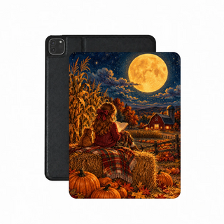 Harvest Moon Reader iPad case — girl reading on a hay bale under a glowing harvest moon, printed front cover over the plain black back