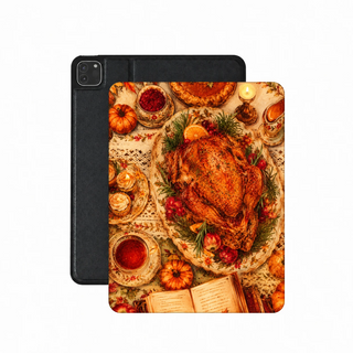 Thanksgiving Table iPad case — top-down Thanksgiving feast with turkey, pie and candles, printed front cover over the plain black back