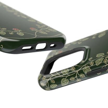 Botanical wreath phone case held in one hand
