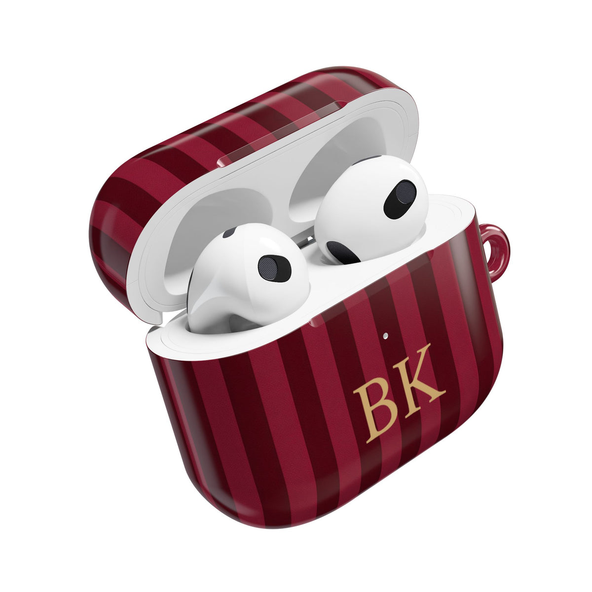 Burgundy stripe AirPods case open — AirPods inside, gold initials on the front