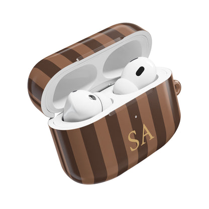 Mocha Stripe monogram AirPods case open with AirPods inside — glossy polycarbonate
