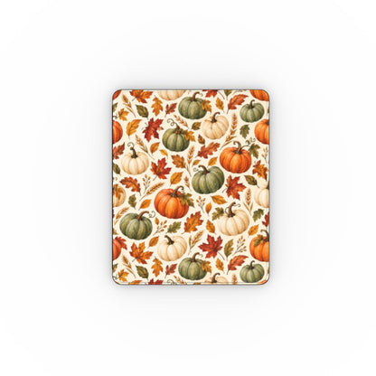 Watercolor pumpkin iPad folio open on its stand, cream autumn print with black Saffiano back