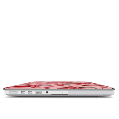 Chili Peppers & Bows MacBook case — hard-shell laptop cover, side view with ports