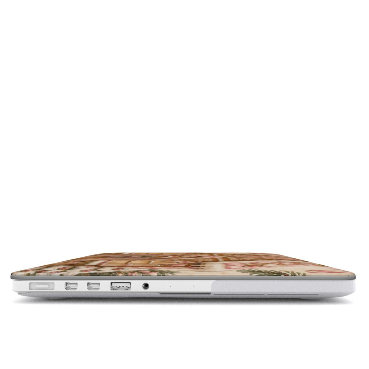Gingerbread House MacBook case — hard-shell laptop cover, side view with ports