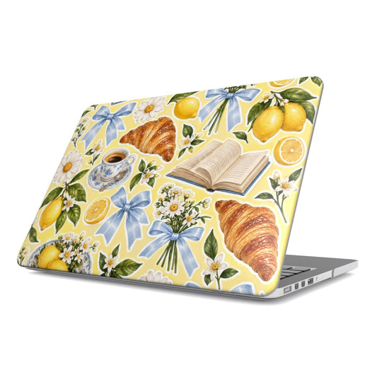 Lemons & Croissants MacBook case — hard-shell laptop cover, angled lid view