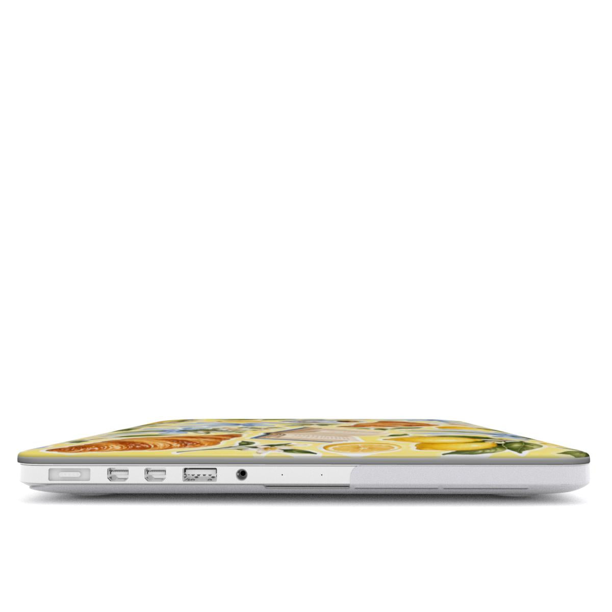 Lemons & Croissants MacBook case — hard-shell laptop cover, side view with ports