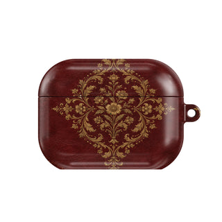 Oxblood Gilded Binding AirPods case — hard-shell earbuds cover, closed front view