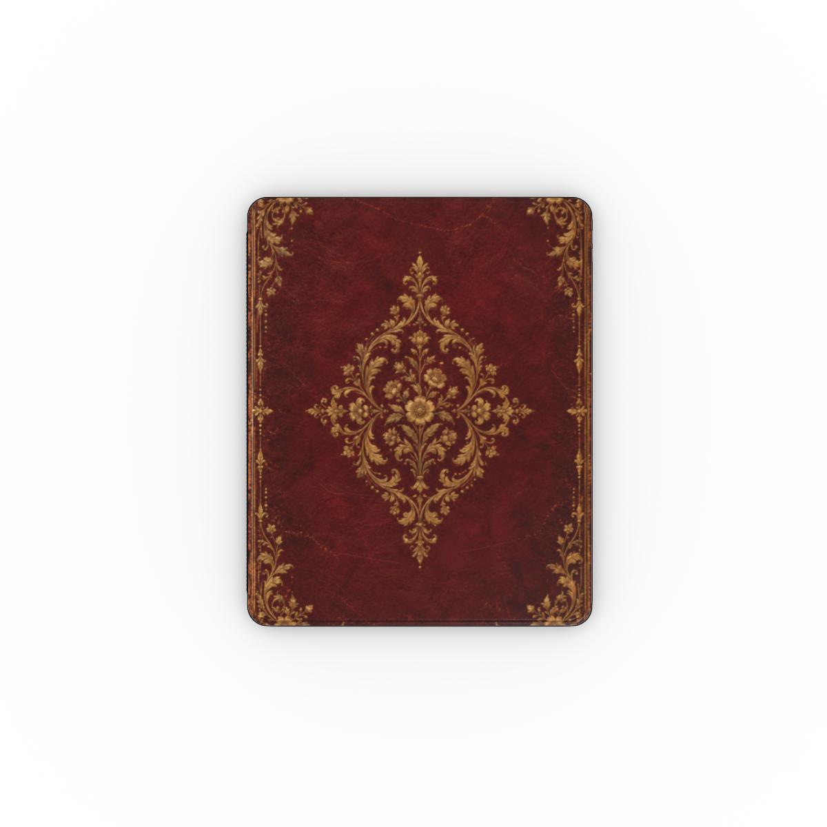 Oxblood Gilded Binding iPad case — gold-tooled filigree medallion on oxblood