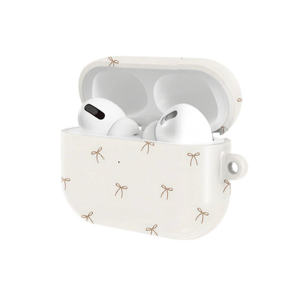 Taupe Bows AirPods case — hard-shell earbuds cover, open angled view