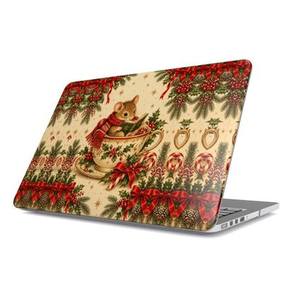 Teacup Mouse MacBook case — tiny mouse in a red scarf reading a book inside a holly teacup, hard-shell laptop cover, angled lid view