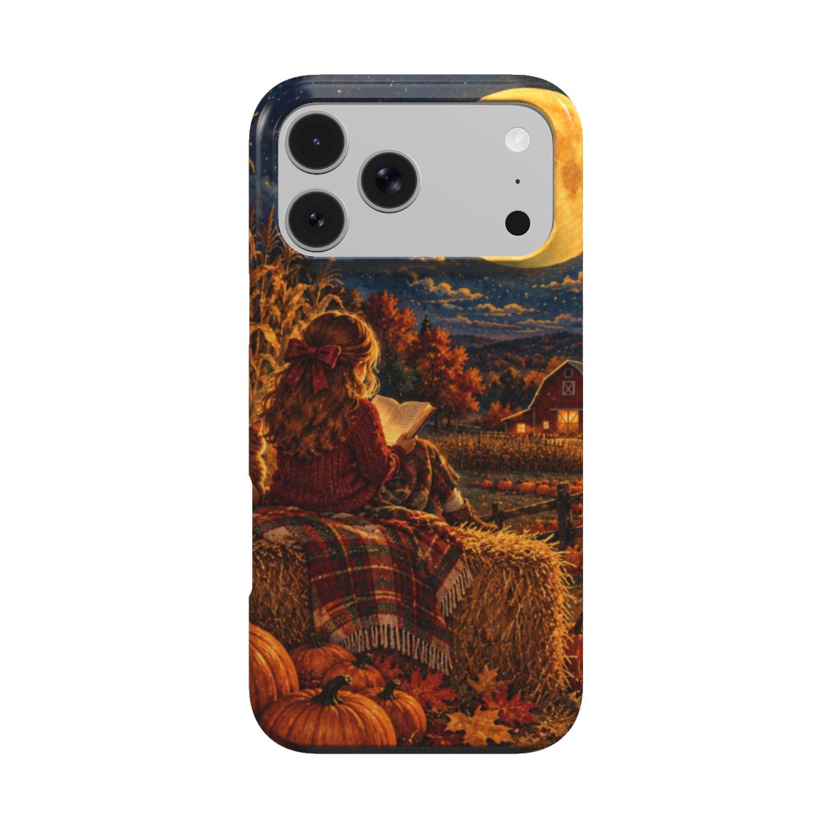 Harvest Moon Reader phone case — girl reading on a hay bale under a glowing harvest moon, MagSafe iPhone case, front view