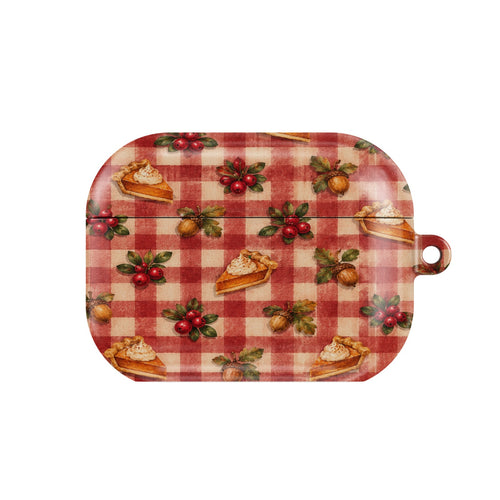 Cranberry Gingham AirPods case — cranberry sprigs, acorns and pie slices on red gingham, closed front view