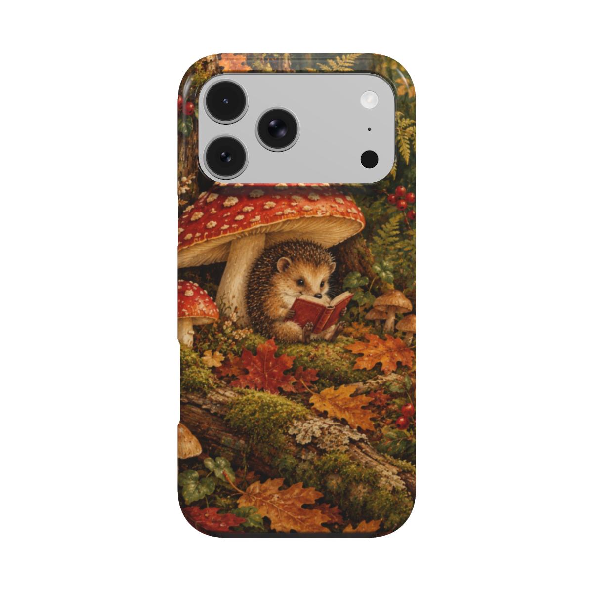 Mushroom Forest phone case — hedgehog reading under red mushrooms on a mossy forest floor, MagSafe iPhone case, front view