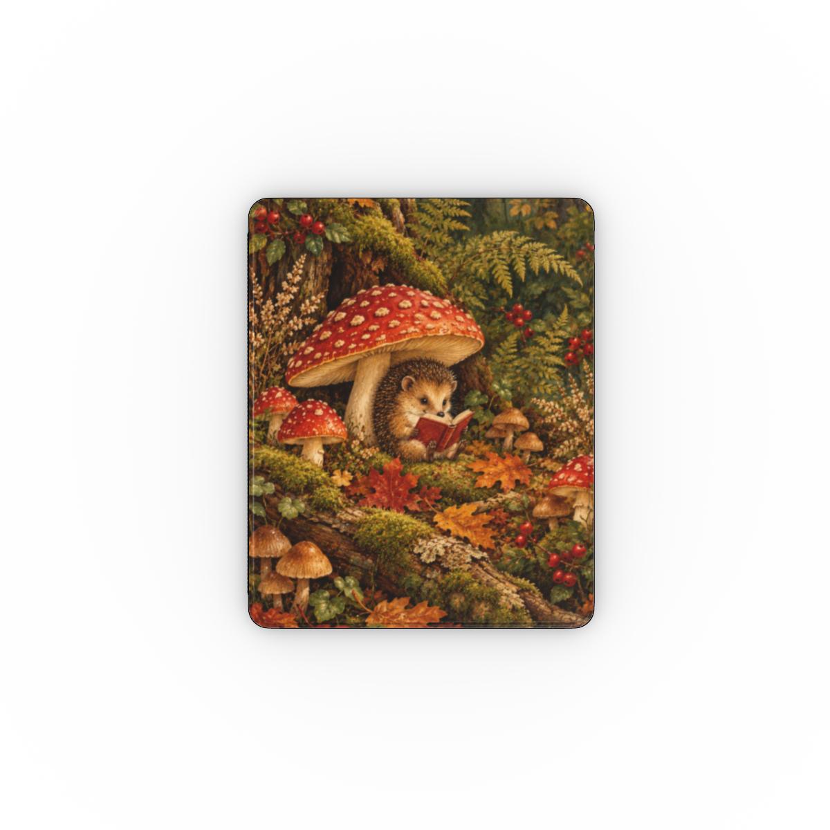 Mushroom Forest iPad case — hedgehog reading under red mushrooms on a mossy forest floor