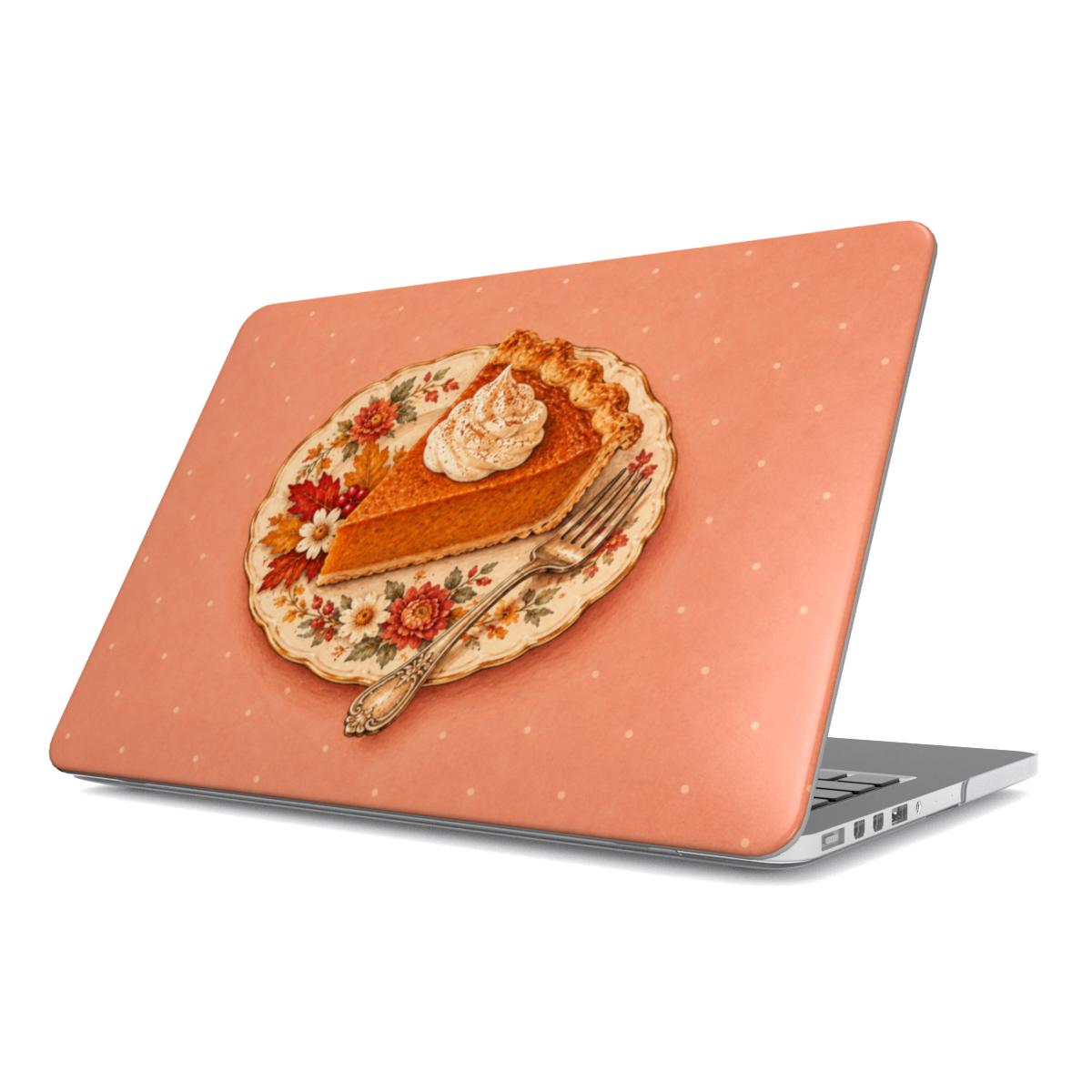 Pumpkin Pie Slice MacBook case — slice of pumpkin pie with whipped cream on a floral plate, hard-shell laptop cover, angled lid view