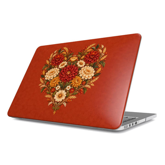 Grateful Hearts MacBook case — folk-art heart of dahlias, mums and wheat on terracotta, hard-shell laptop cover, angled lid view