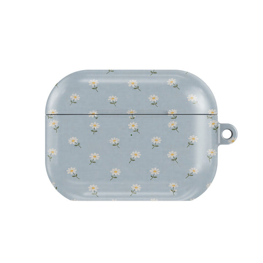 Ditsy Daisy Blue AirPods case — tiny white daisies on powder blue, closed front view