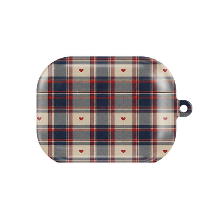 Heart Plaid AirPods case — navy, red and cream plaid with tiny hearts, closed front view