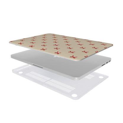 Tiny Red Bows MacBook case — hard-shell laptop cover, two-piece shell view