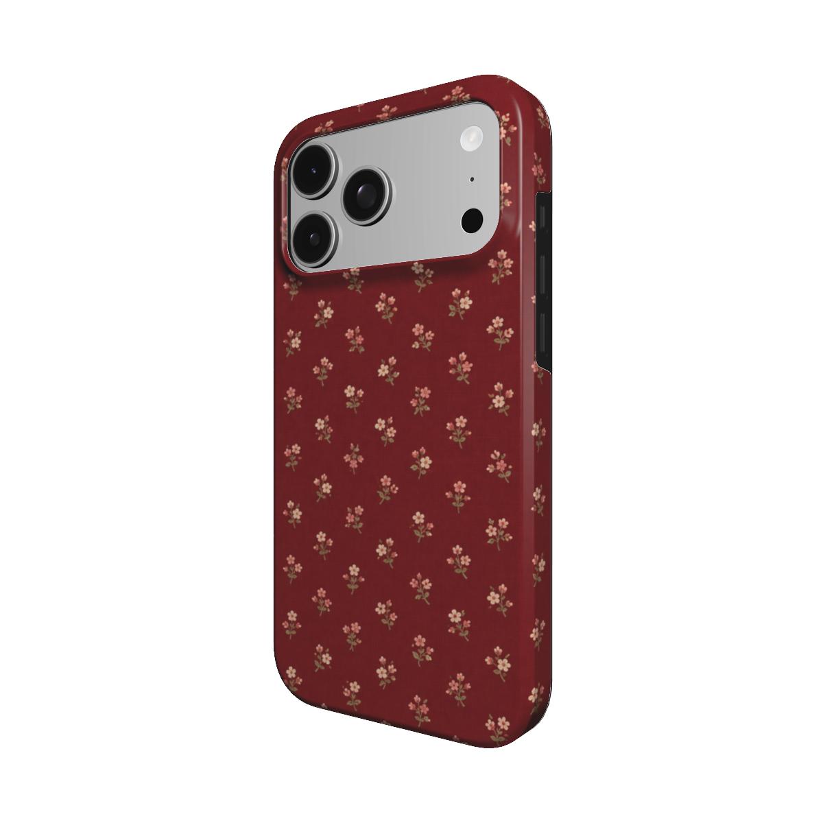 Burgundy Ditsy Floral phone case — MagSafe iPhone case, angled view