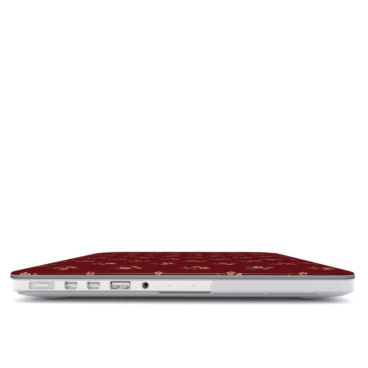 Burgundy Ditsy Floral MacBook case — hard-shell laptop cover, side view with ports