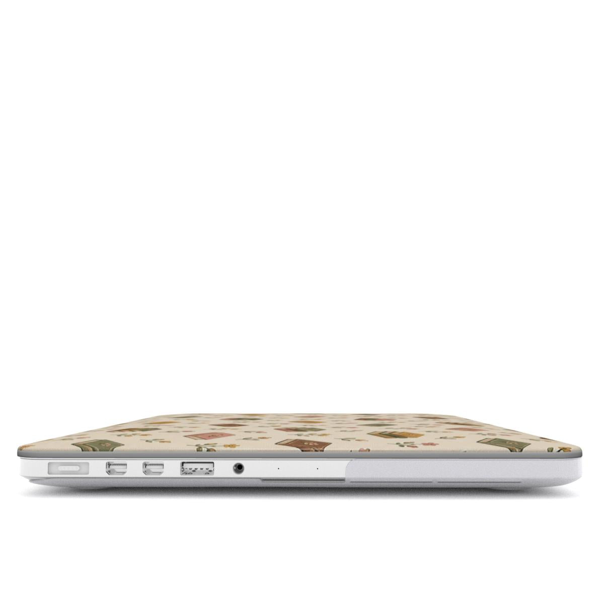 Tiny Books MacBook case — hard-shell laptop cover, side view with ports