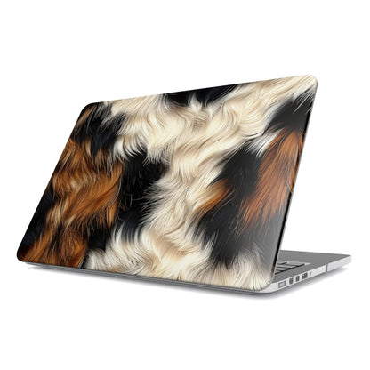 Tricolor Cowhide MacBook case — cow print, hard-shell laptop cover, angled lid view