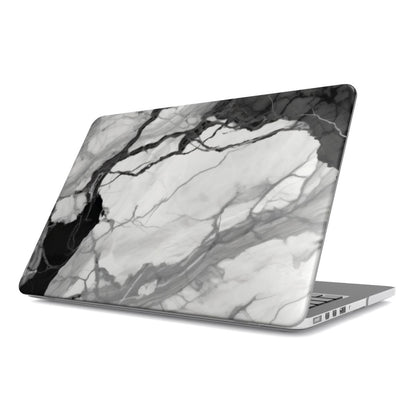 Black & White Marble MacBook case — monochrome, hard-shell laptop cover, angled lid view