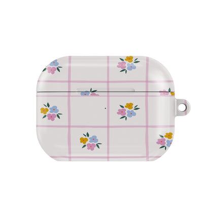 Ditsy Floral Check AirPods case — blush floral, closed front view