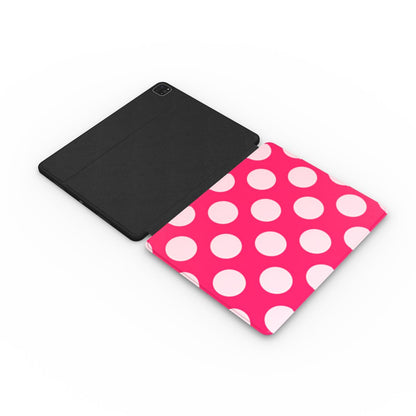 Raspberry Polka Dot iPad case opened flat — printed front cover with plain black interior