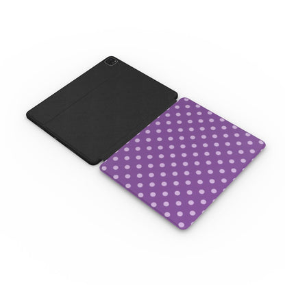 Plum Polka Dot iPad case opened flat — printed front cover with plain black interior
