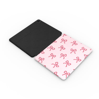 Red Bows iPad case opened flat — printed front cover with plain black interior