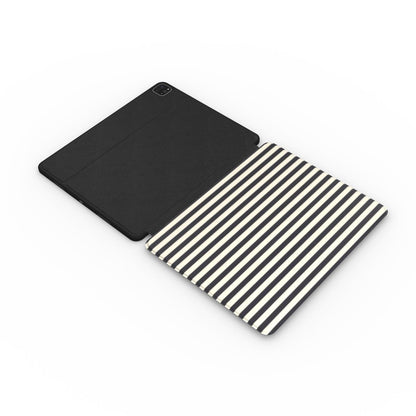 Black & Cream Stripe iPad case opened flat — printed front cover with plain black interior