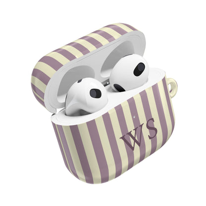 Mauve stripe AirPods case open — AirPods inside, initials on the front