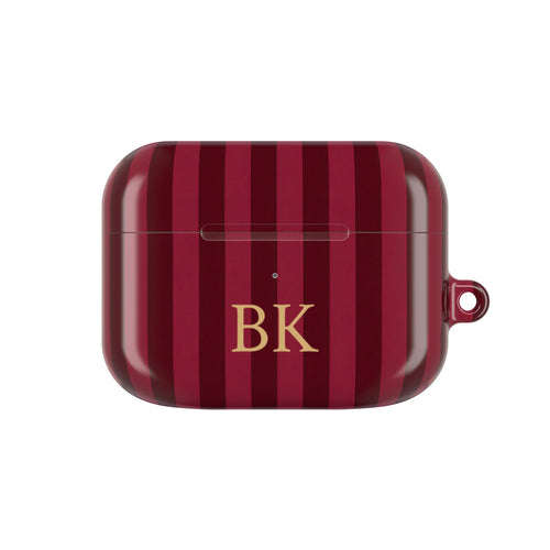 Burgundy Stripe monogram AirPods case — wine and burgundy stripes with gold serif initials