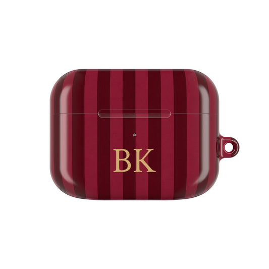 Burgundy Stripe monogram AirPods case — wine and burgundy stripes with gold serif initials