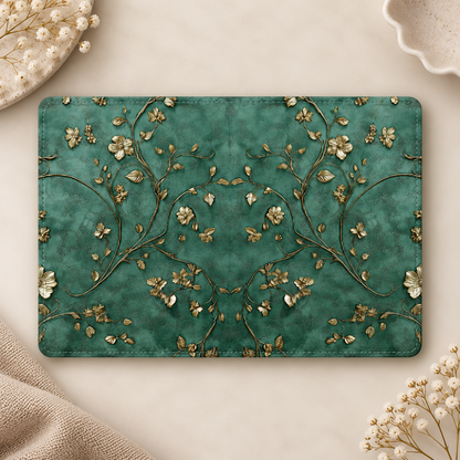 Antique Gold Blossom Kindle case opened flat, front and back — gold vines and blossoms on deep teal