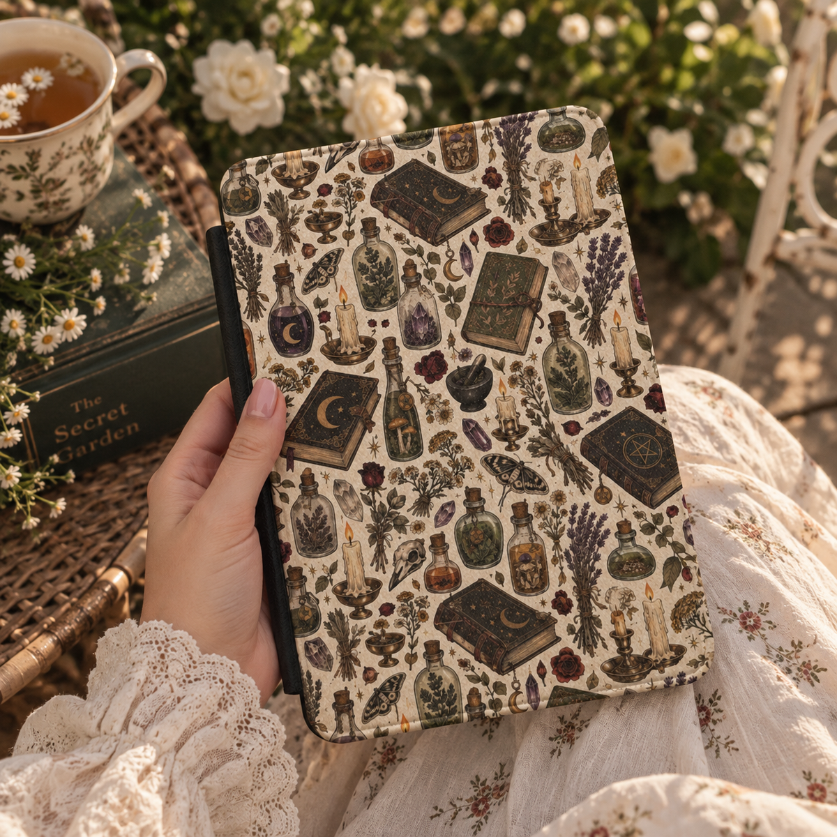 Herbalist's Apothecary Kindle case styled with dried flowers and a candle