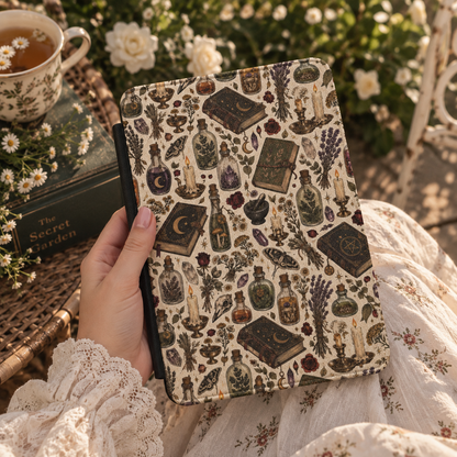 Herbalist's Apothecary Kindle case styled with dried flowers and a candle