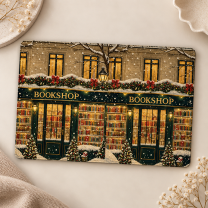 Christmas Bookshop Kindle case opened flat, front and back — snowy bookshop storefront with glowing windows