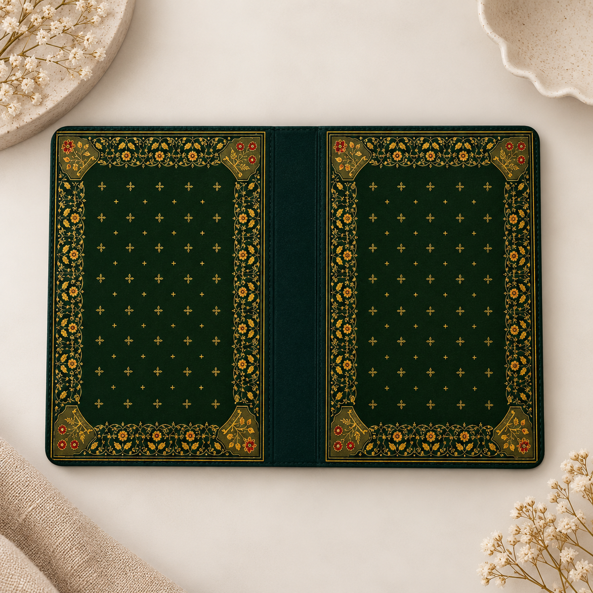 Gilded Antique Binding Kindle case opened flat, front and back — dark green with ornate gold border and gold dots
