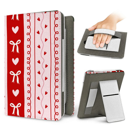 Bows & Hearts Stripe Kindle case — elastic hand strap and fold-out stand on the back