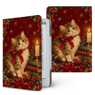Christmas Cat Kindle case — fluffy kitten with a red bow beside a candle and stack of books, printed front and back