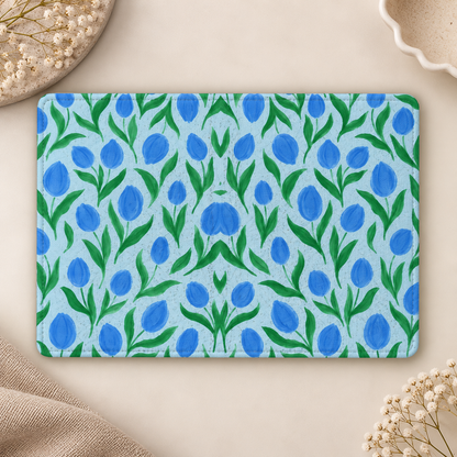 Painted Tulip Kindle case opened flat, front and back — cobalt blue tulips and green leaves on pale blue