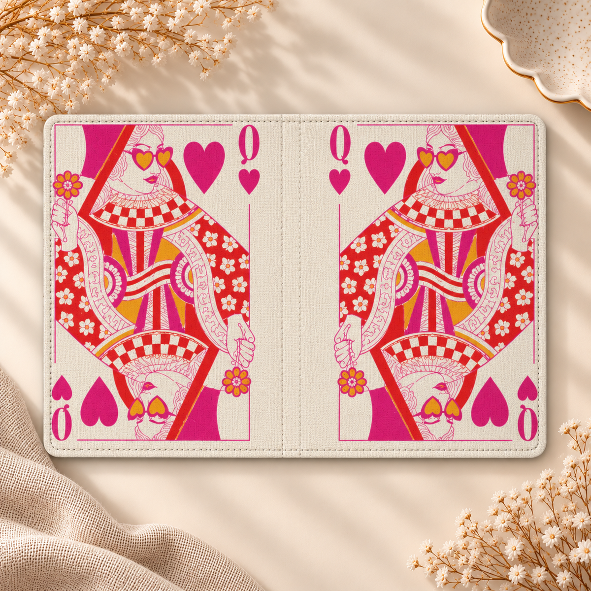 Queen of Hearts Kindle case opened flat, front and back — pink and red playing-card queen on cream