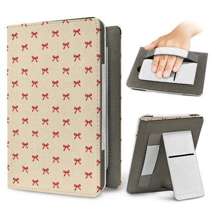 Tiny Red Bows Kindle case — elastic hand strap and fold-out stand on the back